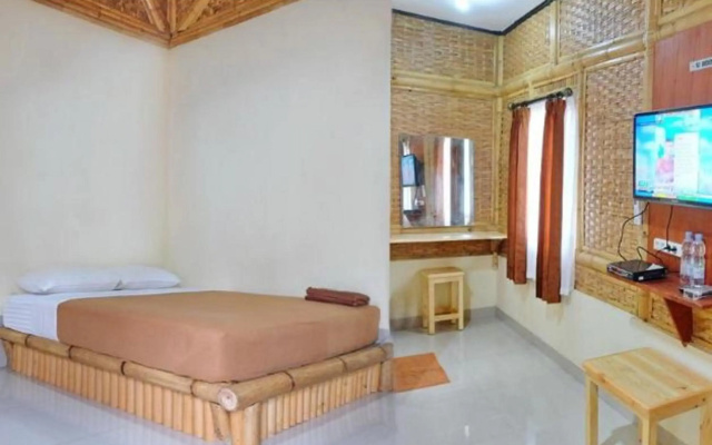 OYO 3303 Penginapan Putri Asih Sawarna