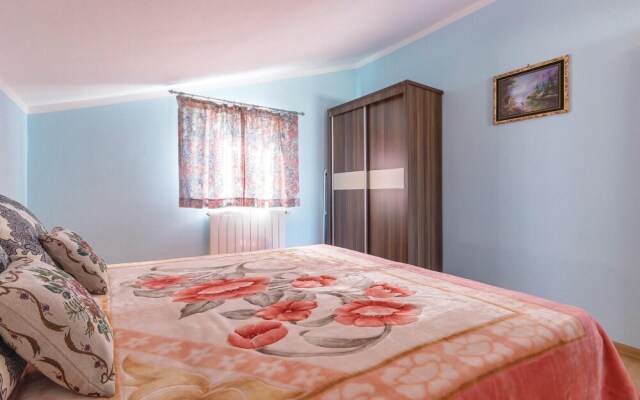 Nice Home in Peroj With Wifi and 2 Bedrooms