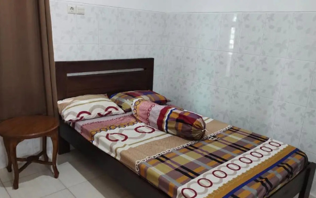 OYO 91233 Bismo 85 Family Syariah