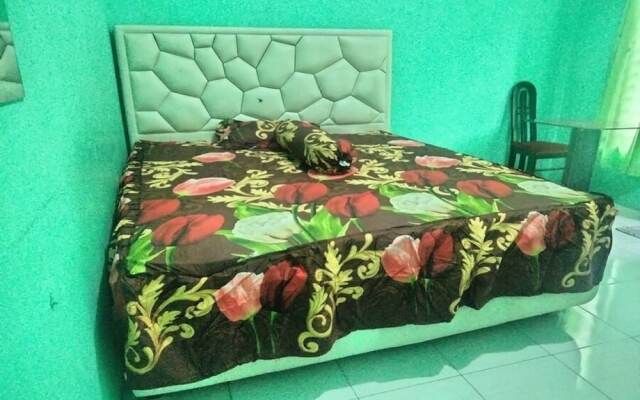 SPOT ON 92839 Nany Asoka Syariah Near Anyong Cafe Studio
