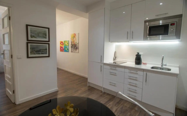 Almada Studios & Suites