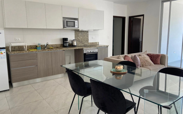 Hermoso departamento con piscina y estacionamiento