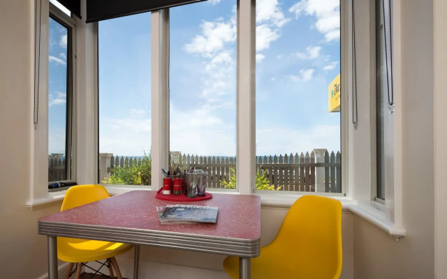 Penguin Waterfront Escape