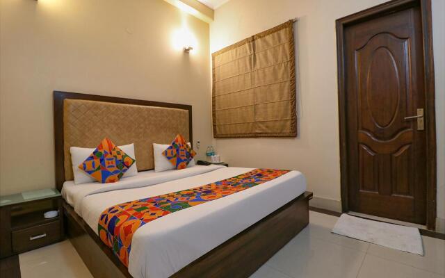 FabHotel Happy Residency