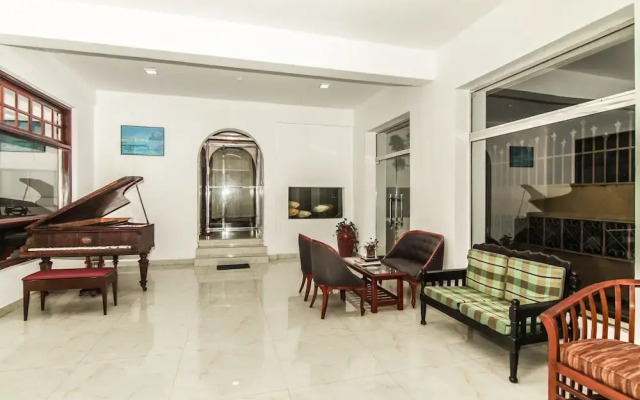 Oyo 115 Qi Mag Apartments