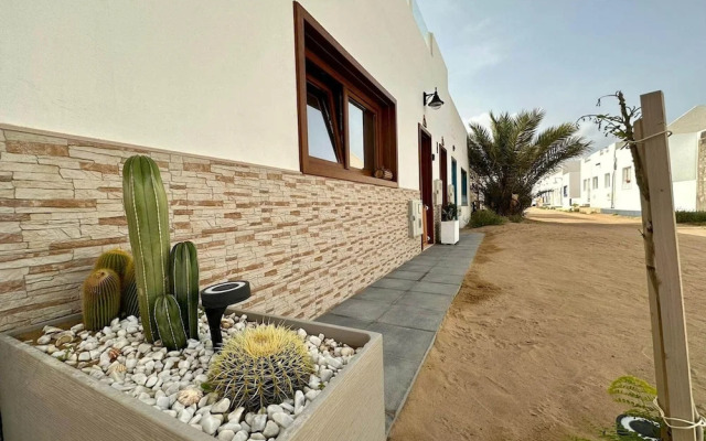 Bayside La Graciosita Traditional Home