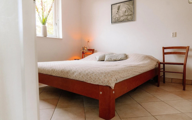 Nice Holiday Home on the Water in Grou