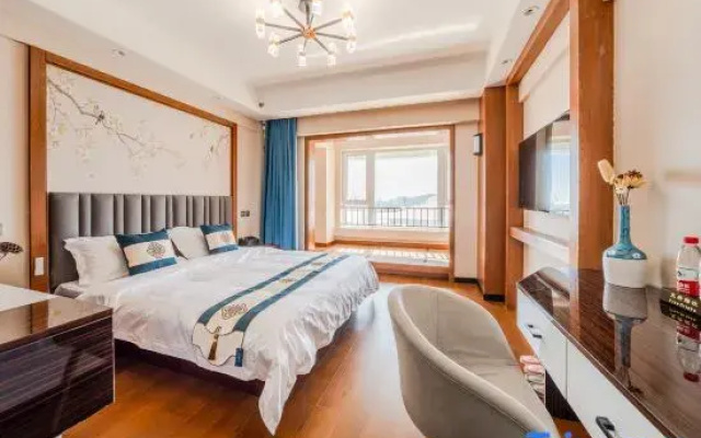 Qingcheng Serviced Apartment (Development Zone Shibeiwan Dream Water Park)