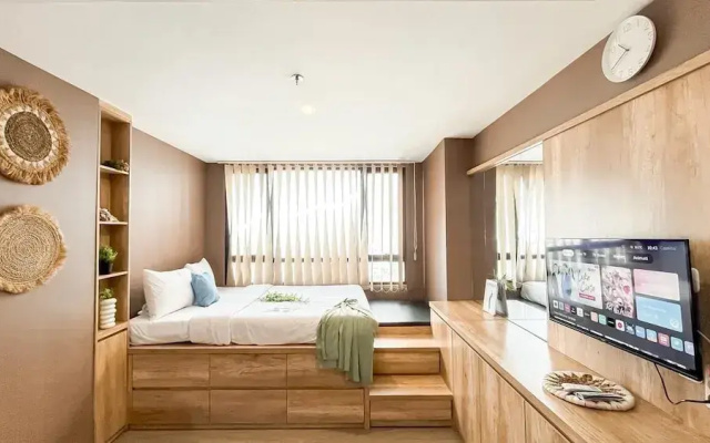 Earth Toned Studio Apartment Collins Boulevard