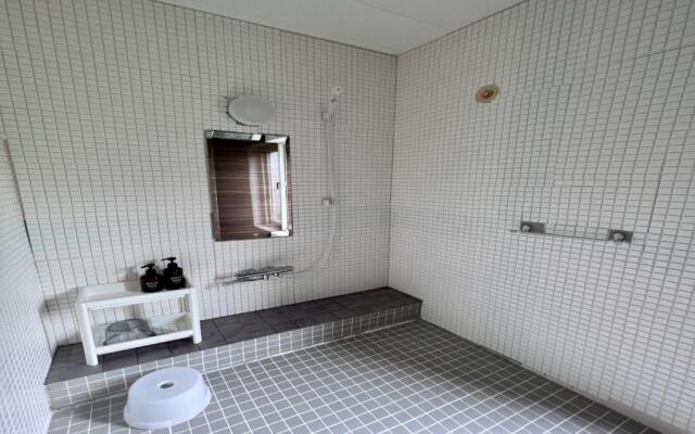 Yellow House by Lake Toya