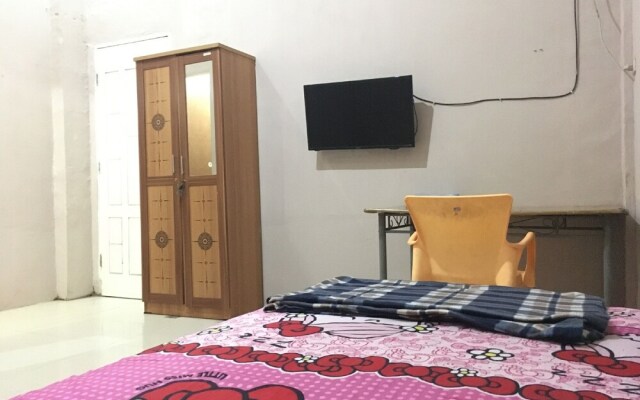 Oyo 1883 Mulia Tiza