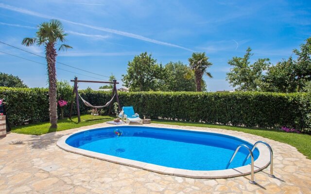 Nicely decorated semi-detached house with pool and  fenced yard