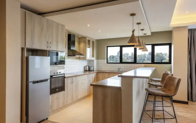 Trademark Suites at Enaki Town