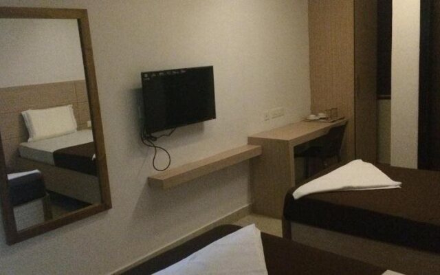 Sri Aditya Inn Boutique Hotel  by OYO Rooms