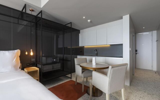 Next Hotel