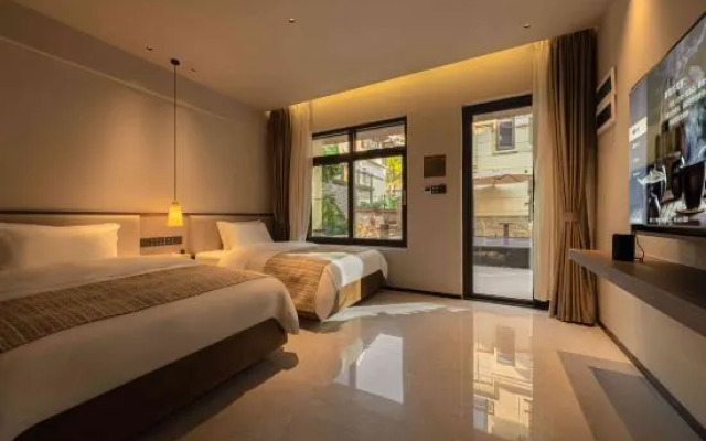 Xishuangbanna Jinghong Yakatu Theme Inn (Mengle Dafo Temple)