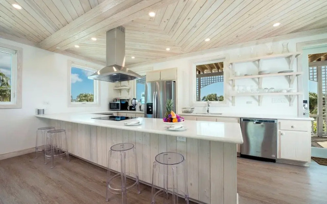 Tropical Haven: Luxurious Home Steps From Beach