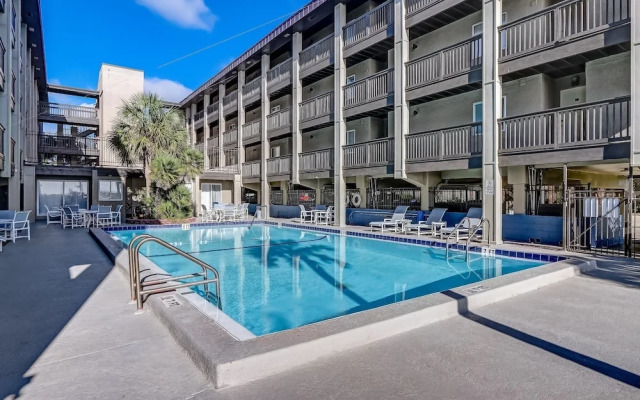 Newly Remodeled Oceanfront Condo with Salt Water Pool and Private Walkway to Beach by RedAwning