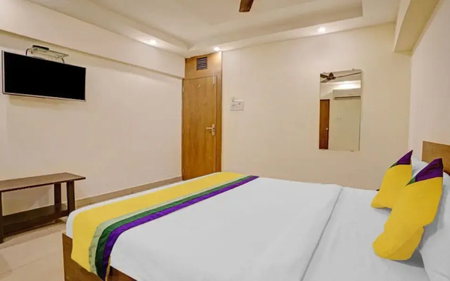 New Harshita inn By Glitz Hotel