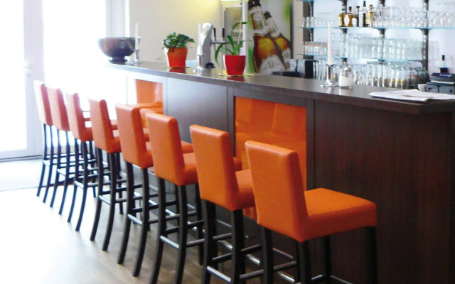 Orange Hotel und Apartments