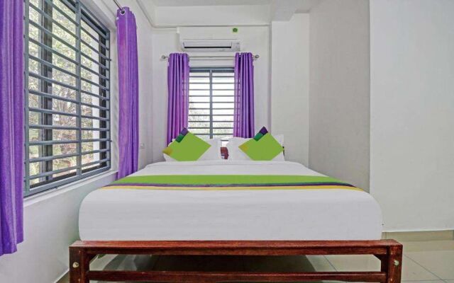 Treebo Nirupama, 750m from Aluva Railway station