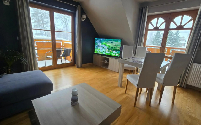 Domek za Strugiem - pokoje i apartamenty