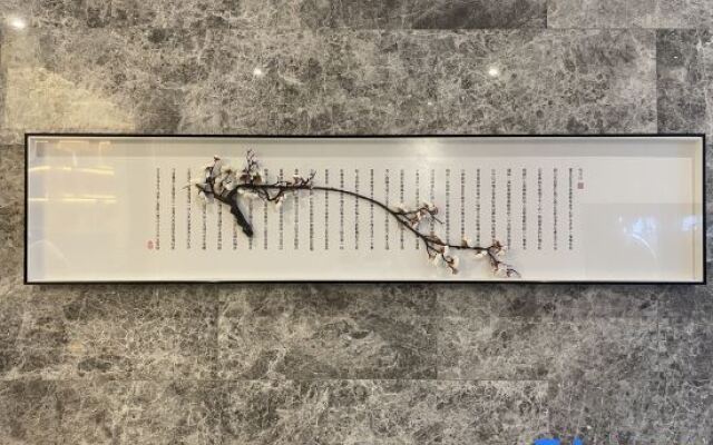 Jianguo Puyin Hotel (Qingdao Wusi Square Qingdao University Branch)