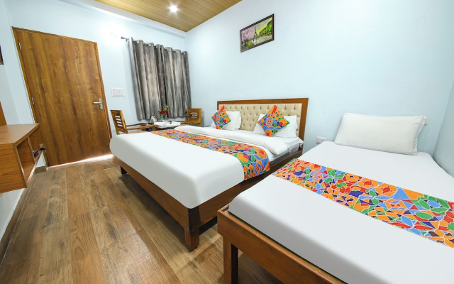 Fabhotel Royal Om River Resort