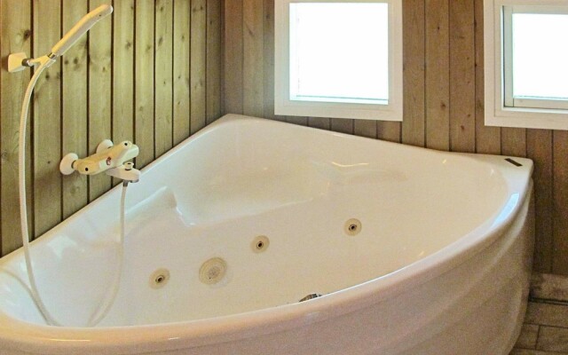 Pleasant Holiday Home in Væggerløse With Whirlpool