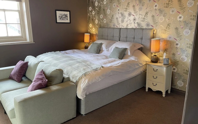 The Plume of Feathers