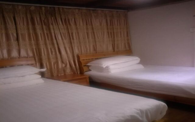 Nanjing Tulou Qingdelou Inn