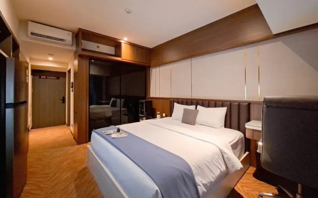 Modern Rustic Studio Apartment At Carstensz Residence