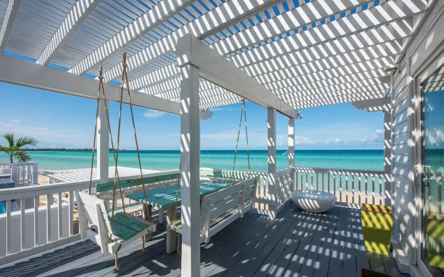 Secluded Luxury: New Beachfront Home With Pool
