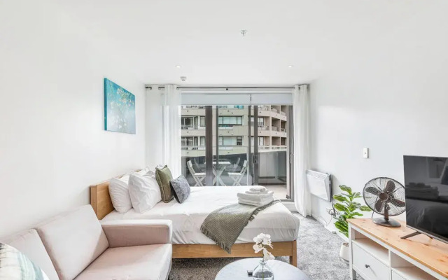 Central Studio + Private Balcony!