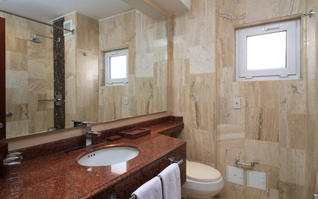 Отель Windsor House Inn By Geh Suites