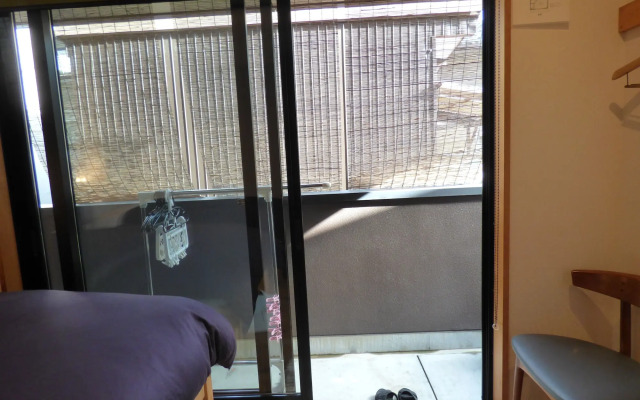 Guesthouse Hyakumanben Cross