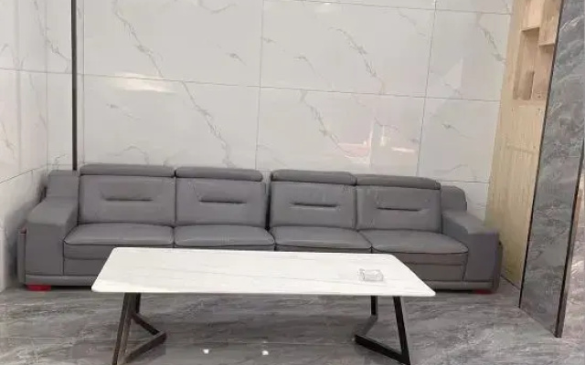 Qiongzhong Santaiyuanlong Business Hotel