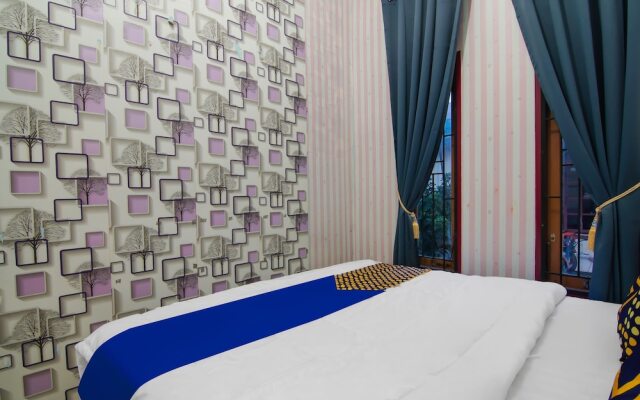 SPOT ON 92570 Putri Guest House Syariah Near SPBU Rimbo Panjang