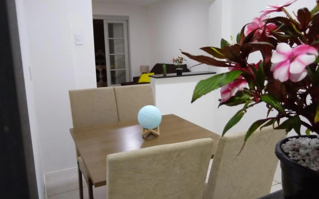 Quarto aconchegante em Apê, no Calçadão