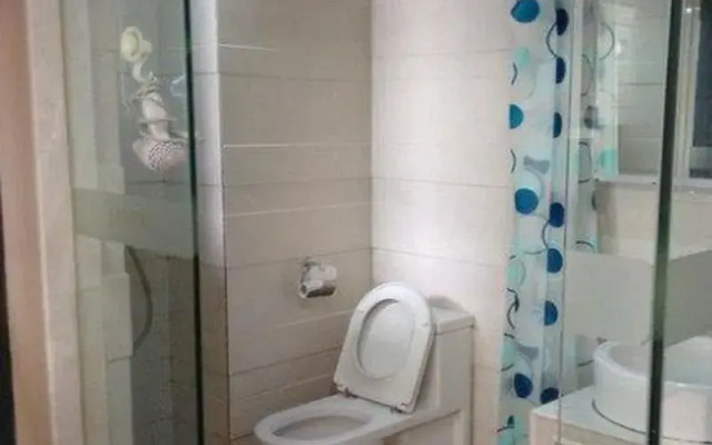 Shengang Hotel Apartment