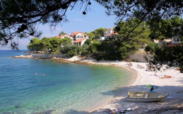 Apartments by the sea Postira, Brac - 18971