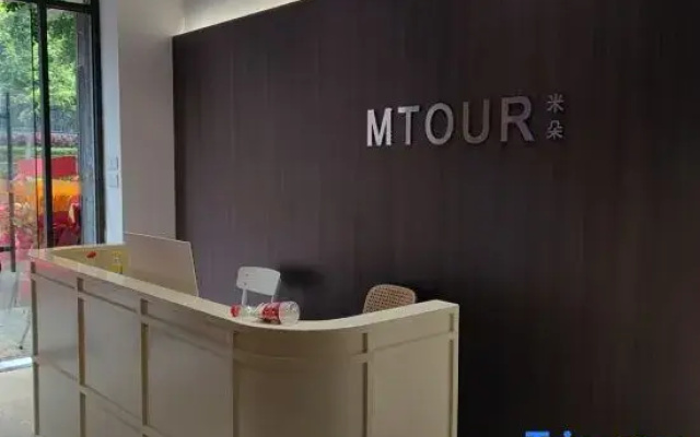 Xiamen Mido Residence Hotel (Gaoqi Airport Banshang Subway Station)