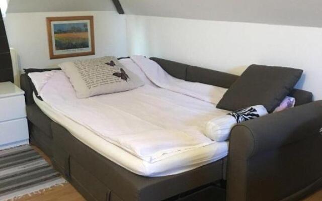 Room near the center with bathroom and kitchen