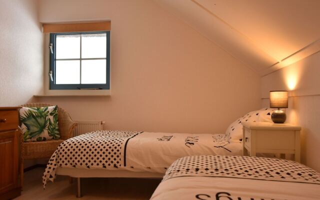 Exclusive Holiday Home Floating on a Lake in Friesland