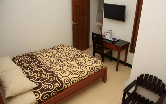 Puri Kusuma Guest House – Guest Rooms – Tabanan