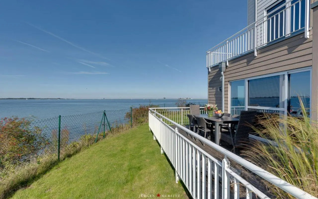Ostseewind: Wasserblick, finnische Sauna, Whirlwanne, Kamin, 2 Parkplaetze
