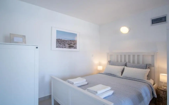 A White Cliffside Studio