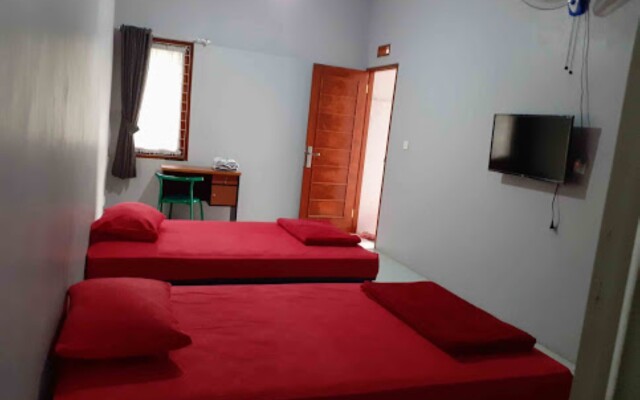 Nabila Syar i Guesthouse by ZUZU