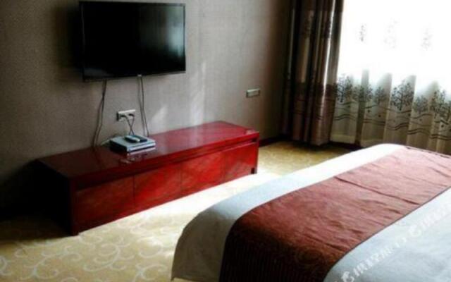 Kuqa Xinyu Hotel (Guiz Plaza)