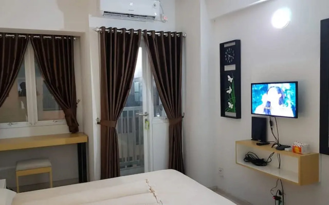 Grand Sentraland Karawang by Gkit Room